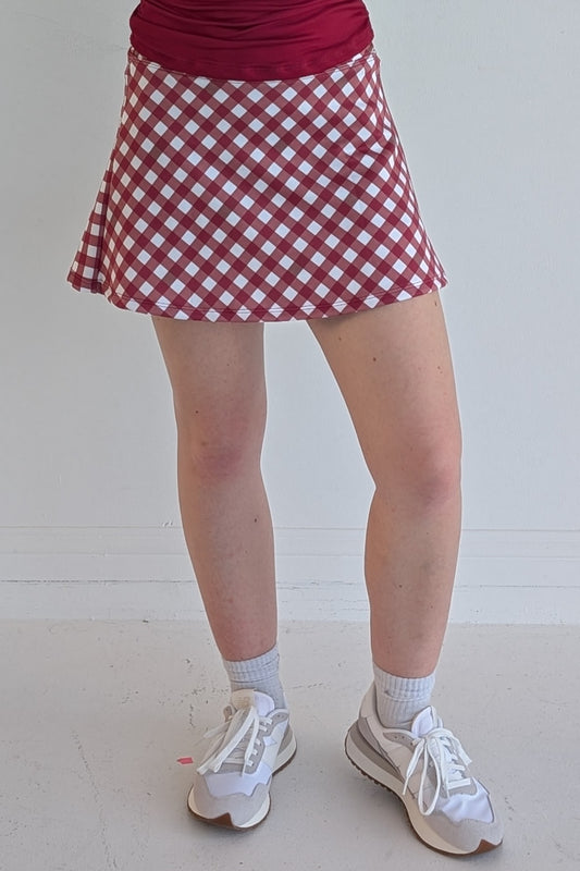 Relaxed back crimson gingham miniskirt with  built in shorts and pockets; great for gameday or hanging out with friends.