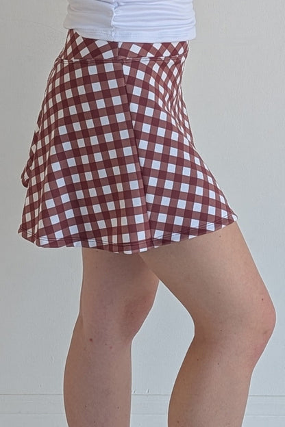 Relaxed back maroon gingham miniskirt with  built in shorts and pockets; great for gameday or hanging out with friends.