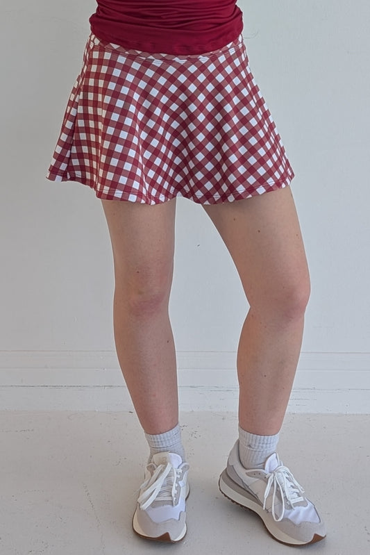 Full bodied crimson gingham miniskirt with  built in shorts and pockets; great for gameday or hanging out with friends.