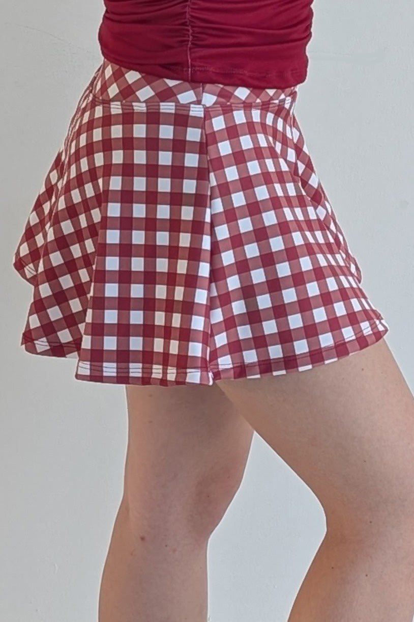 Full bodied crimson gingham miniskirt with  built in shorts and pockets; great for gameday or hanging out with friends.