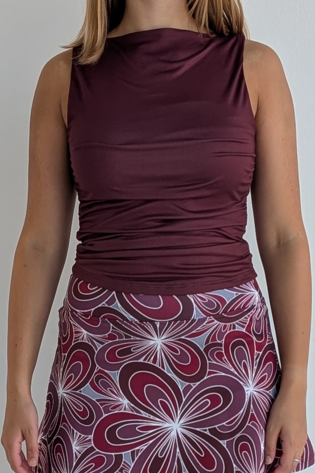 Boat neck maroon sleeveless fully lined top; great for gameday or hanging out with friends.