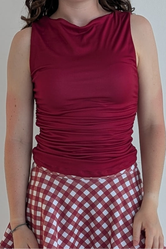 Boat neck crimson sleeveless fully lined top; great for gameday or hanging out with friends.