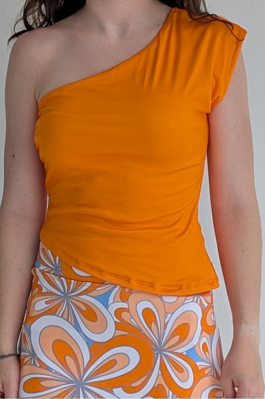 Asymmetric orange single shoulder fully lined top; great for gameday or hanging out with friends.
